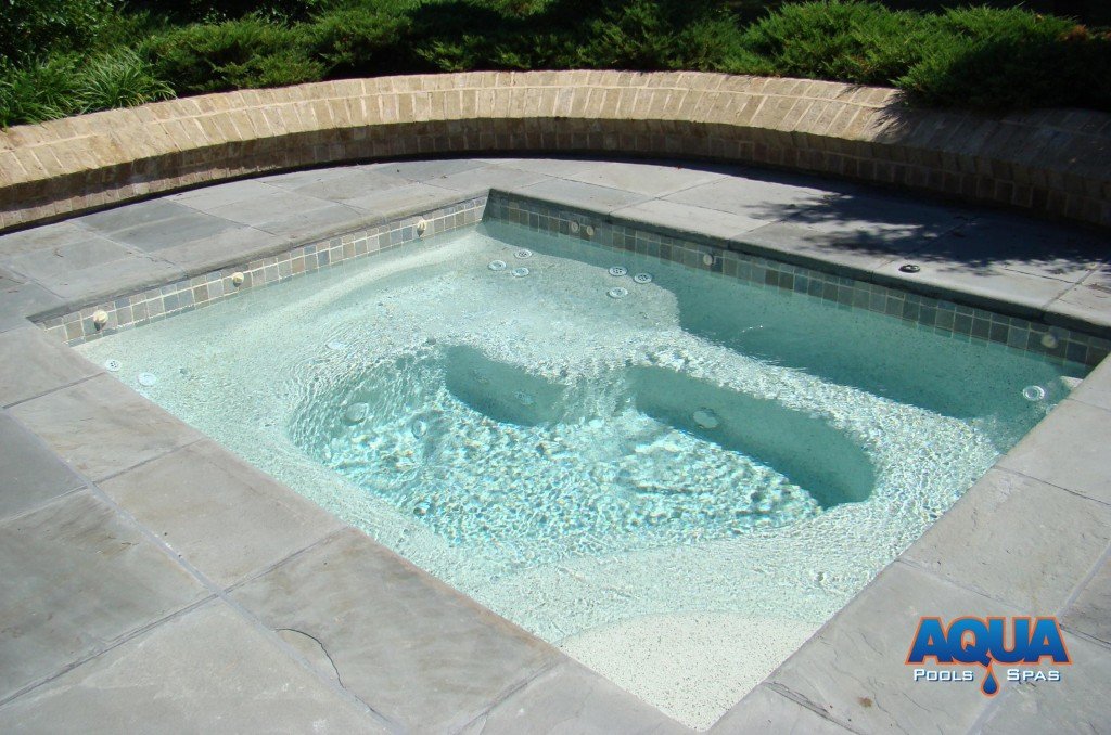 We can contour the interior of the hot tub to approach that of a portable spa.