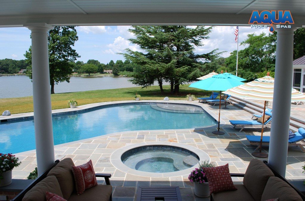 A classic set up with a round spa separate from the pool.