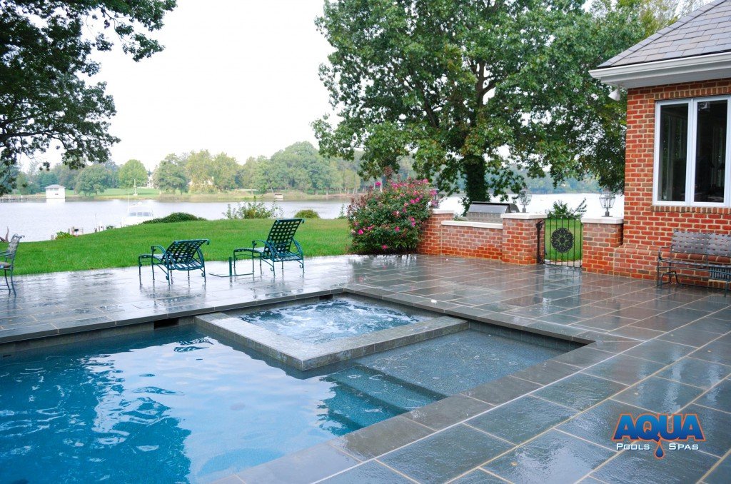 Another example of a pool and spa combo utilizing an automatic cover